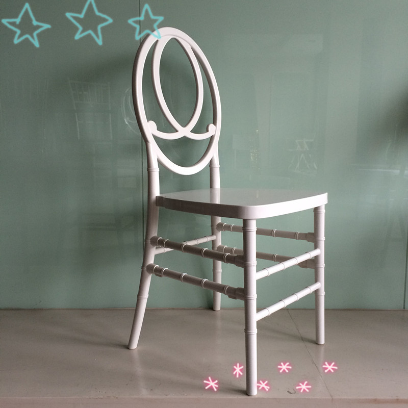 White Plastic Phoenix Chair at Wedding