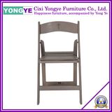 Grey Plastic Resin Folding Chair at Party