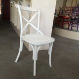 White Resin Plastic Cross Back Chair at Hotel